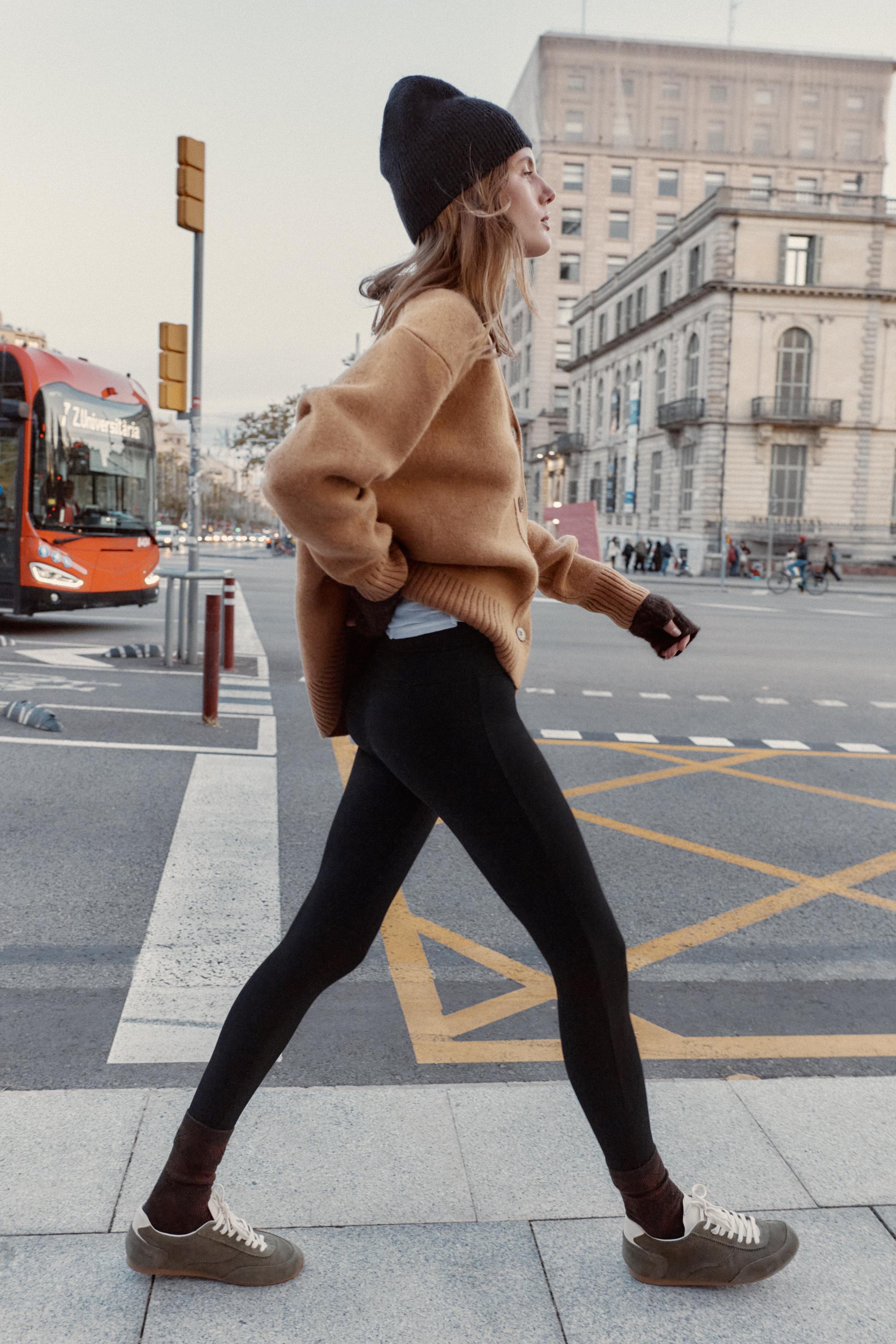 HIGH-WAISTED SLIM PANTS WITH ZIPPER HEM